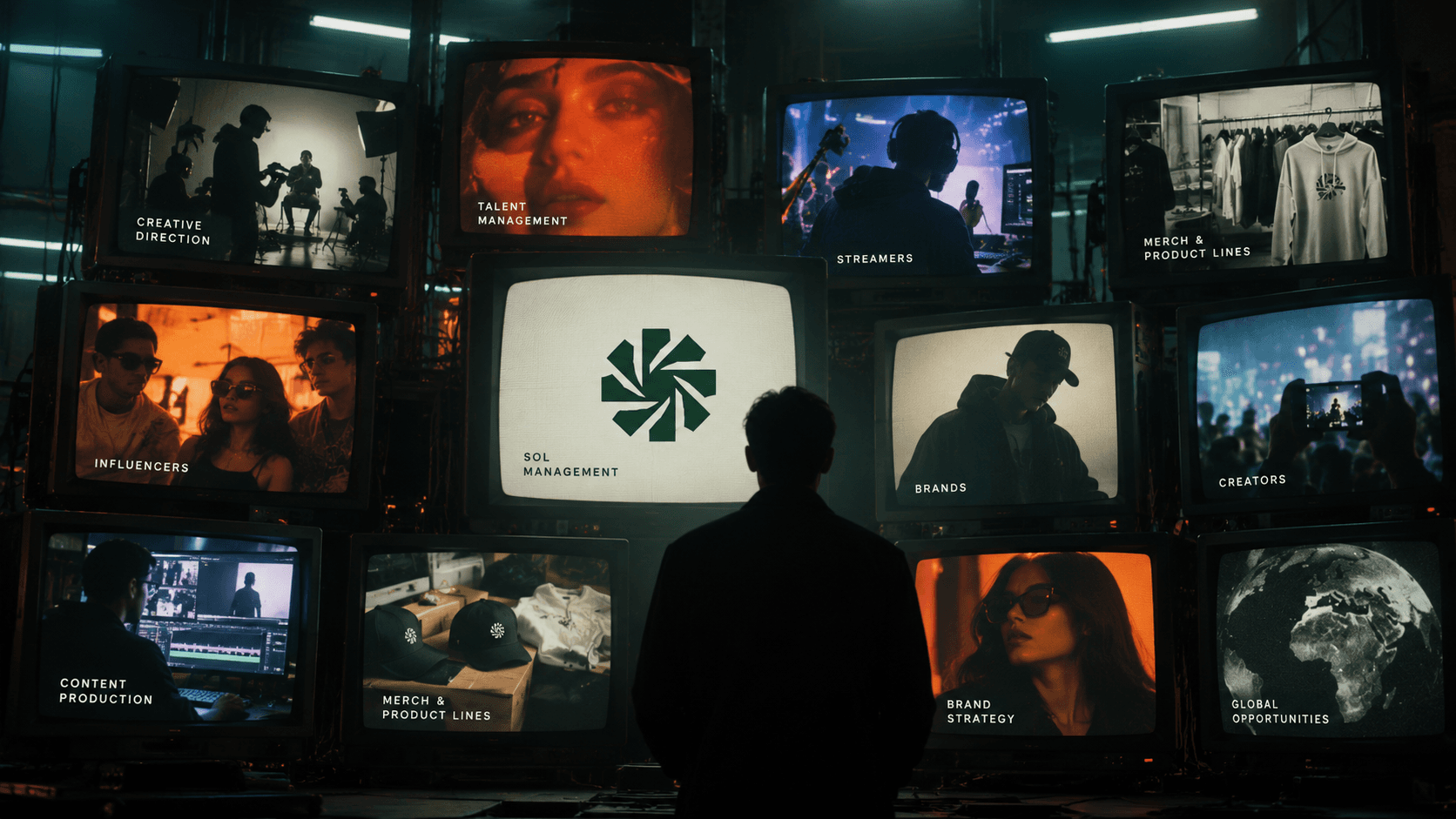 A figure standing before a wall of screens showing SOL Management's verticals: talent, creators, brands, merch and content production.
